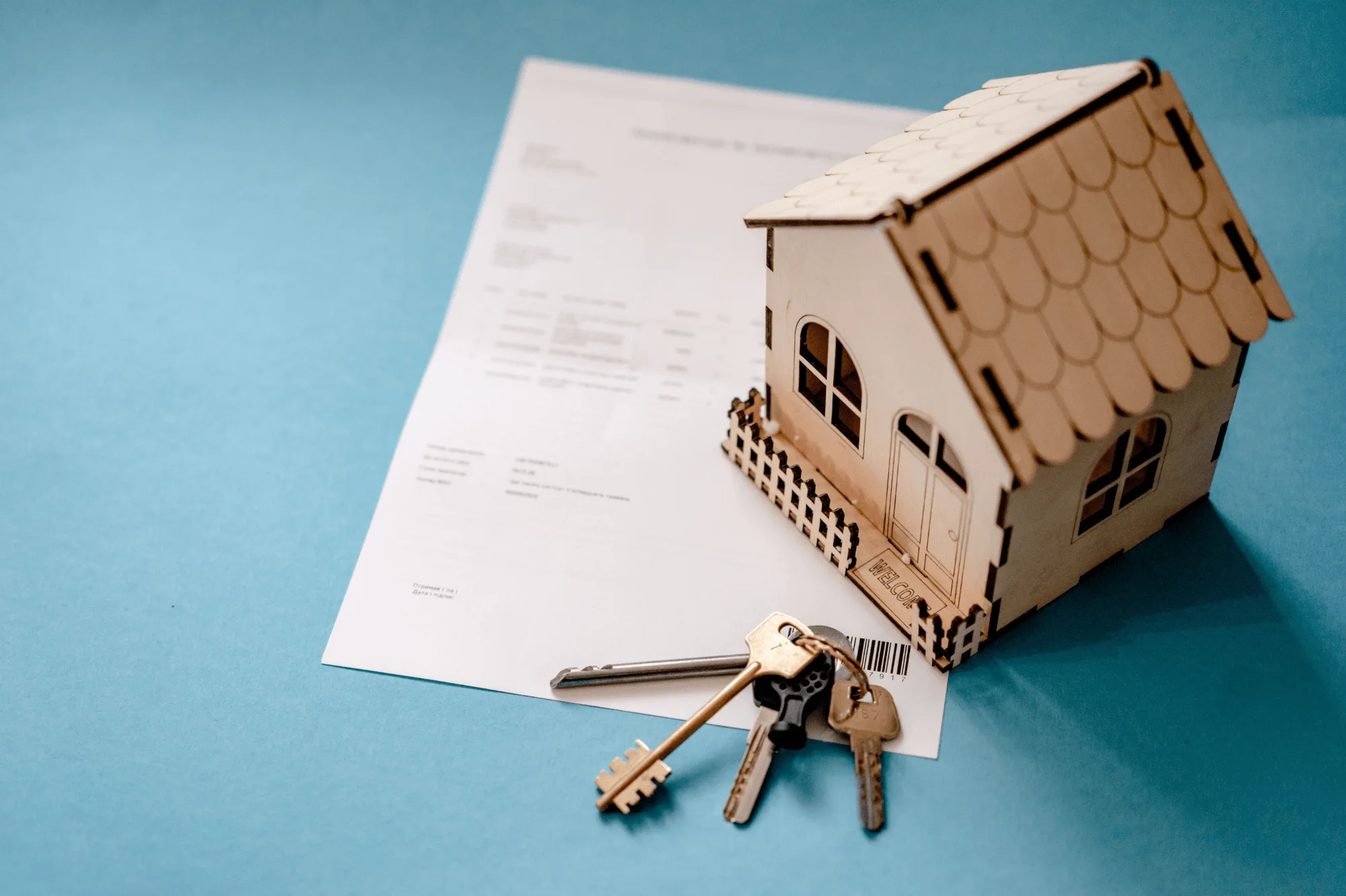 Sarasota County probate court document and inherited house keys on a wooden table