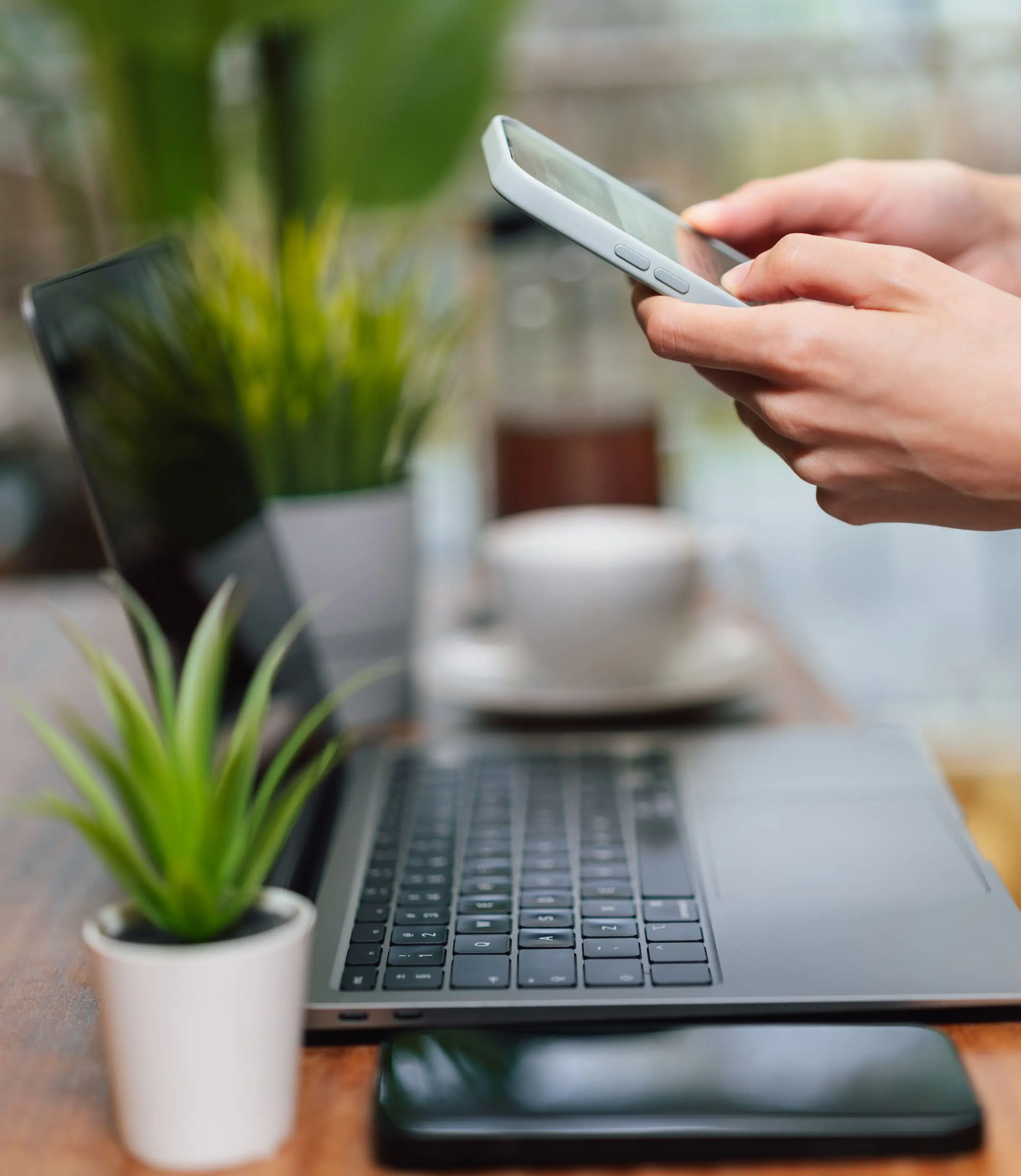 Out of state owner signing real estate closing documents remotely on a laptop via Remote Online Notarization