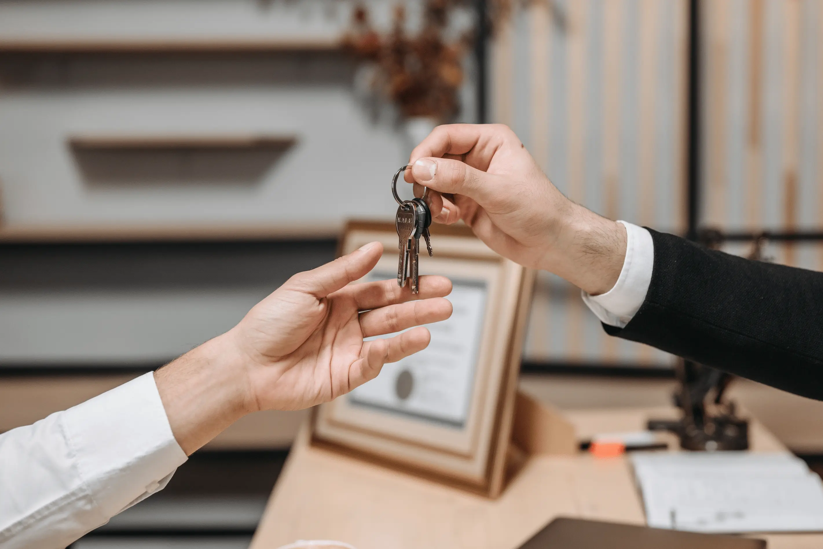Homeowner signing closing documents for a cash real estate transaction