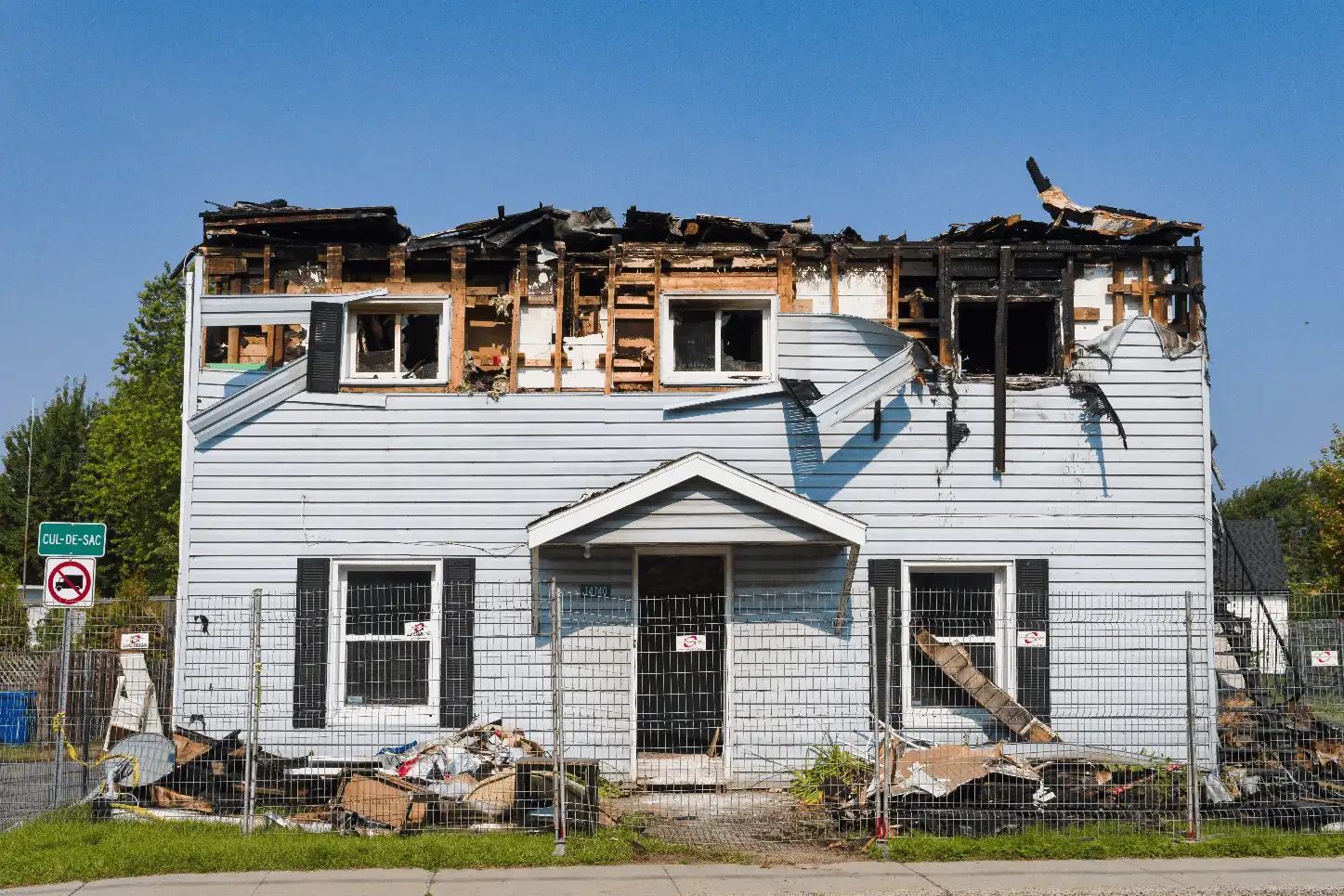 Hurricane damaged residential home in Fort Myers Florida waiting for repairs