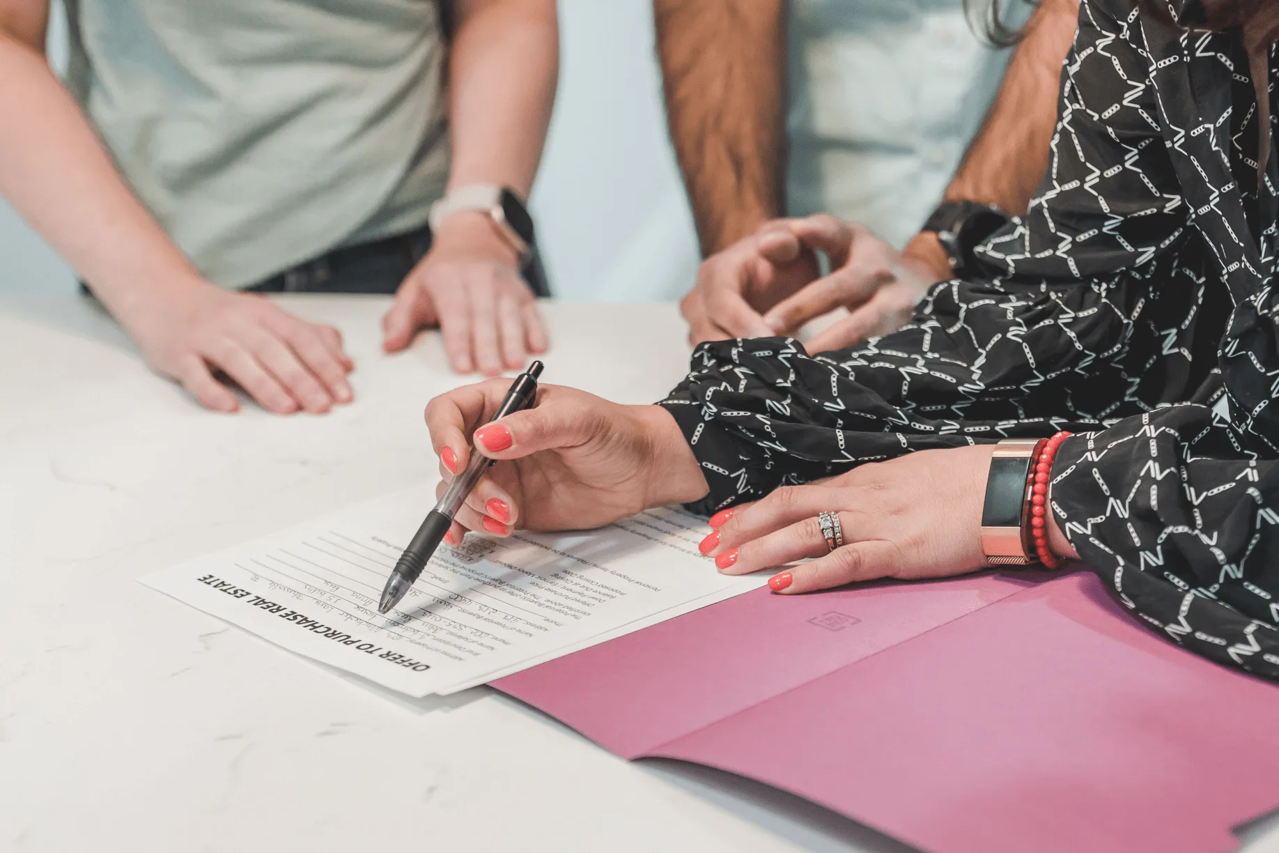 Real estate investor reviewing documents for a fast cash sale in Port Charlotte